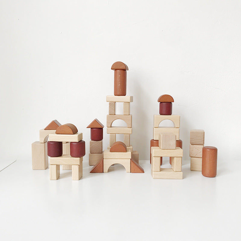 Kids' wooden block set creating towers, bridges and castles