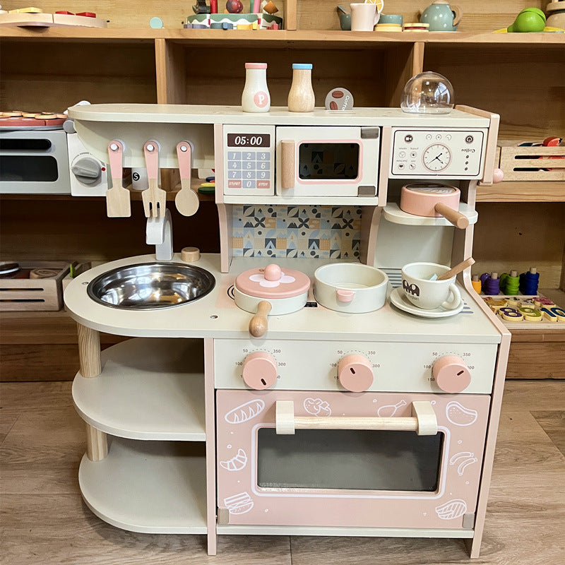 Pink wooden pretend kitchen detail 5: oven, sink, accessories and storage