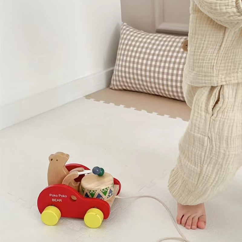 Kinmilo wooden drumming bear pull-along toy mechanism and child play details