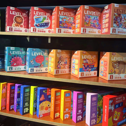 Colourful Level Up progressive jigsaw puzzle series boxes